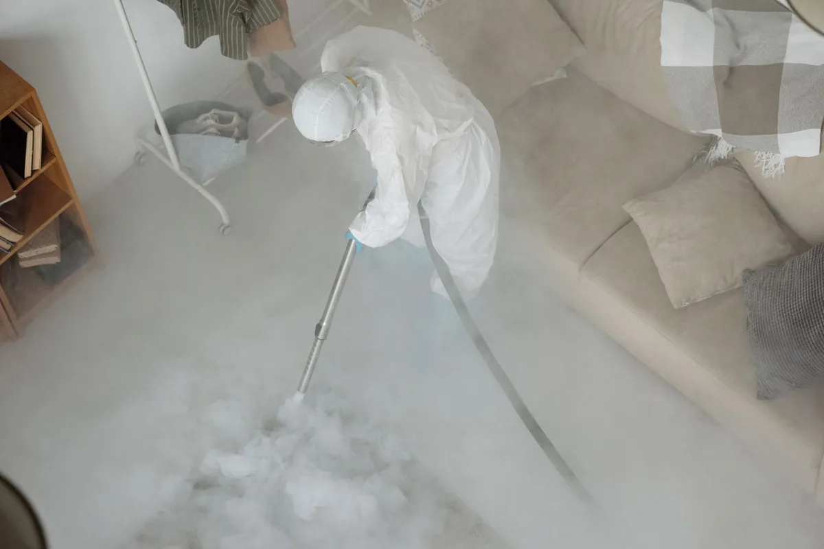 Biohazard cleanup technician in protective equipment, Sandusky, OH